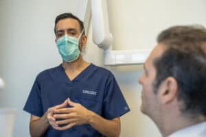 Brisbane CBD dentist advising patient on oral health care