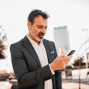 Brisbane CBD professional using phone to book dentist appointment online