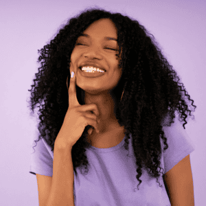 Person feeling more confident and comfortable after improving their smile