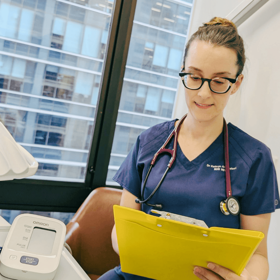 Dental sedationist having sedation consultation with an anxious patient Brisbane CBD